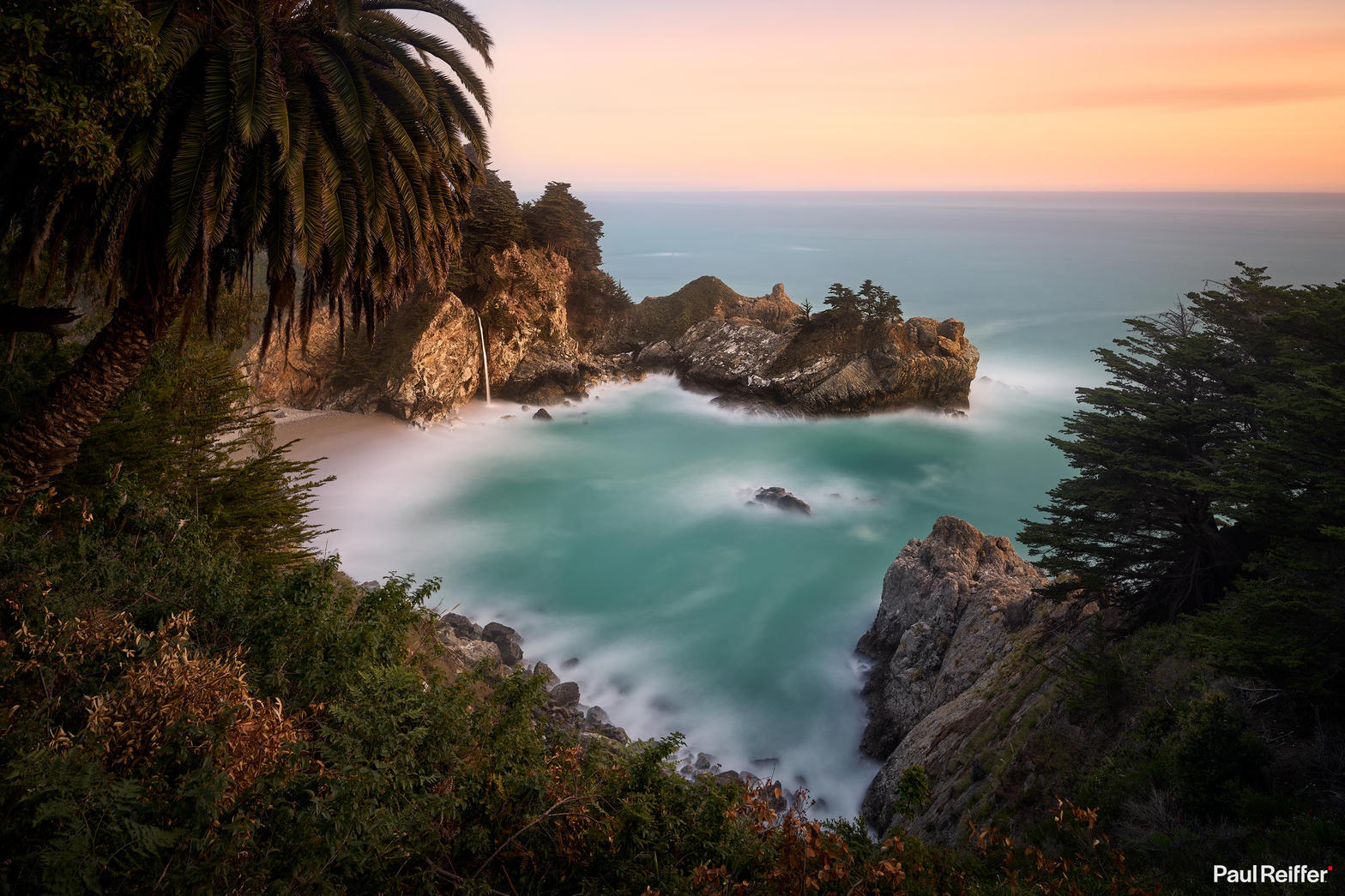 McWay Falls into a turquoise cove