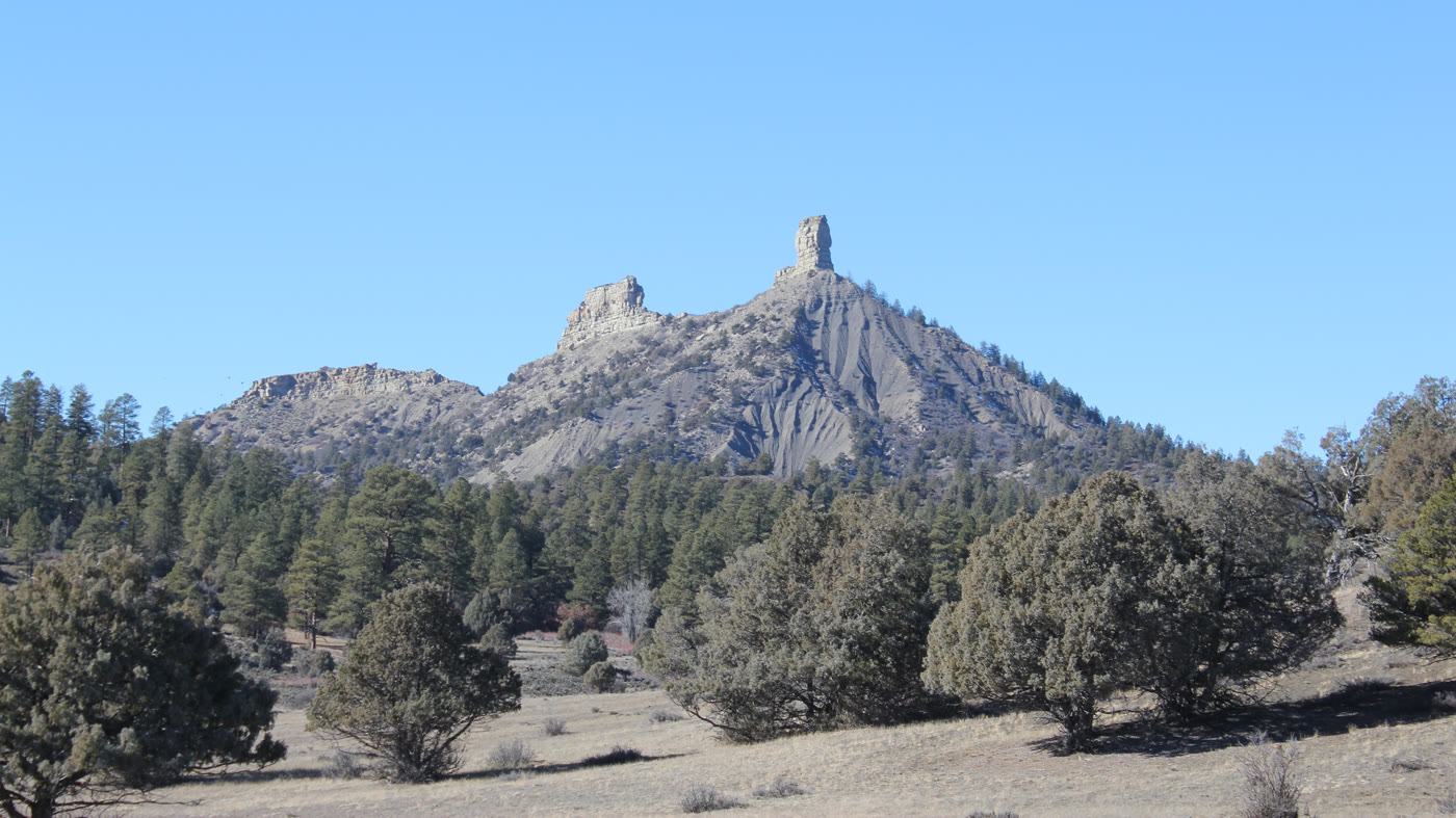 Twin sandstone pillars over ponderosa at Chimney Rock