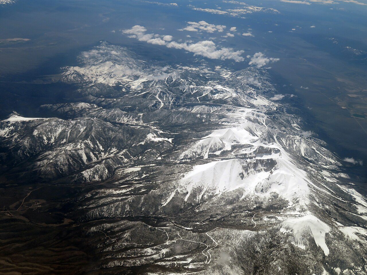 Wheeler Peak towers over a clear alpine lake