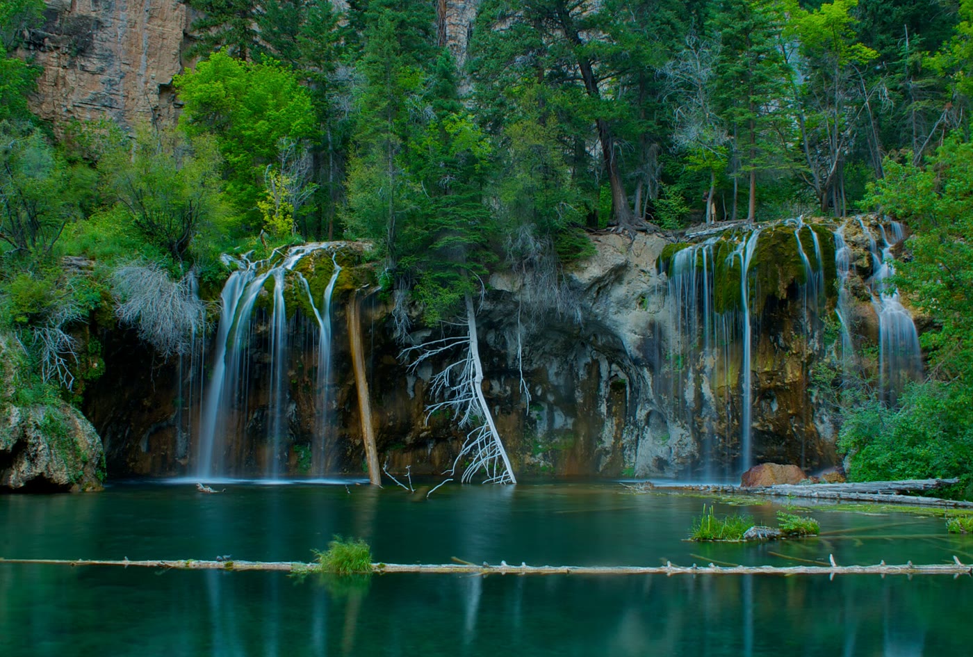 Turquoise water and mossy falls at Hanging Lake