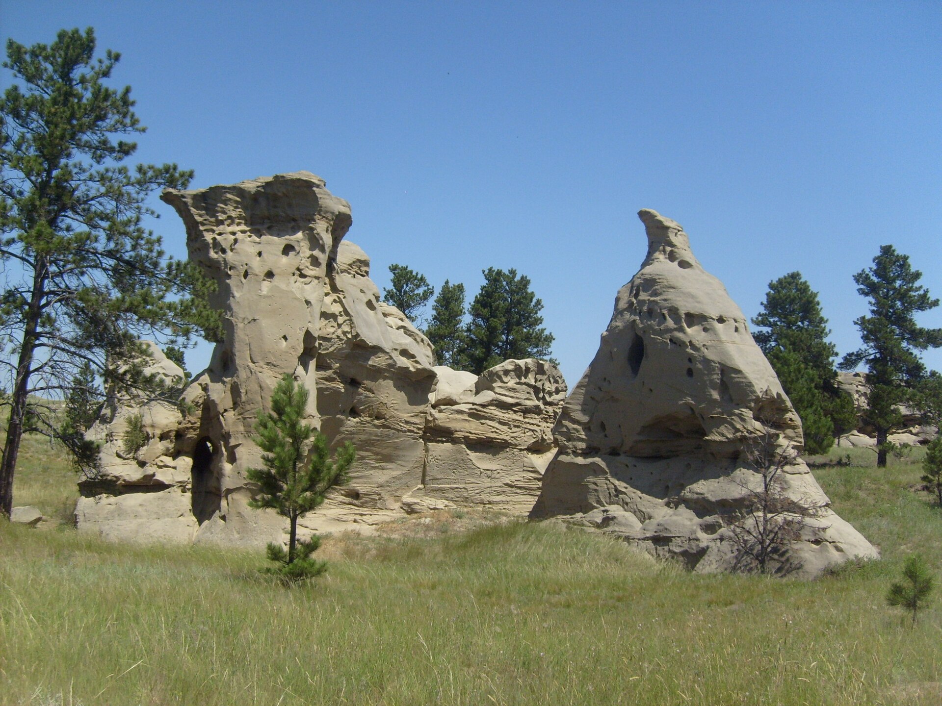Sandstone pillars in the grass at Medicine Rocks State Park
