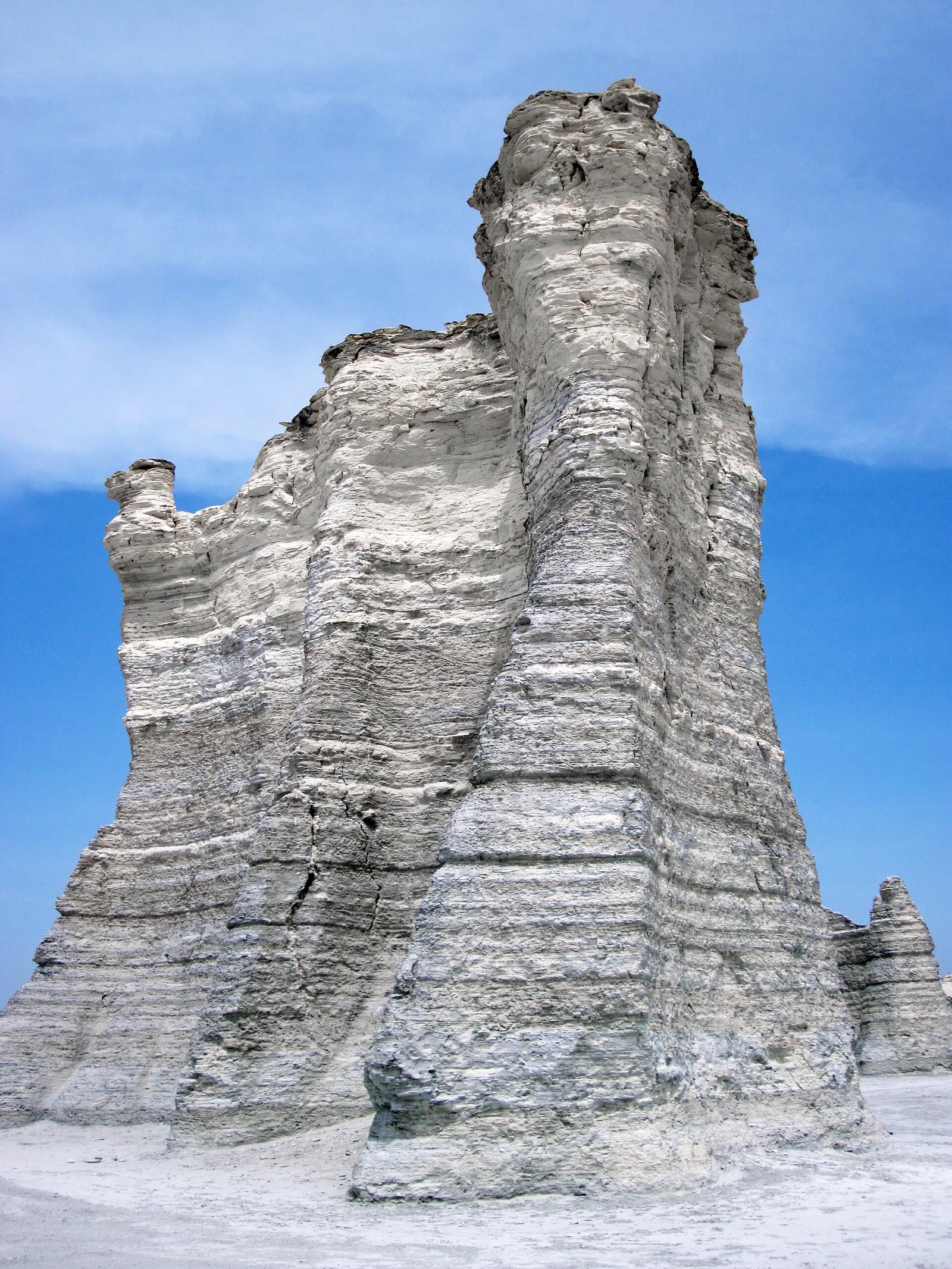 A layered chalk spire on the High Plains, Monument Rocks