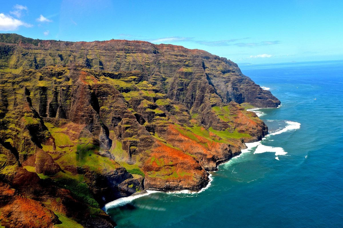 Fluted cliffs meeting the Pacific