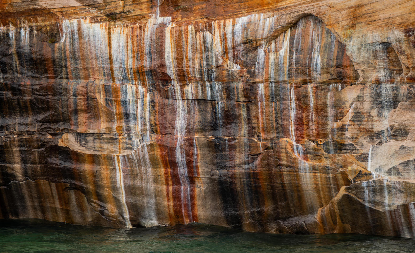 Mineral streaks on the sandstone wall